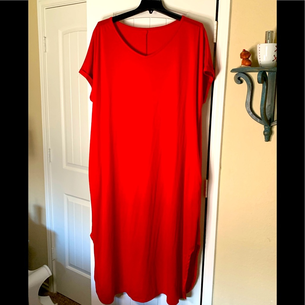 Bright red maxi dress with slits on each side.